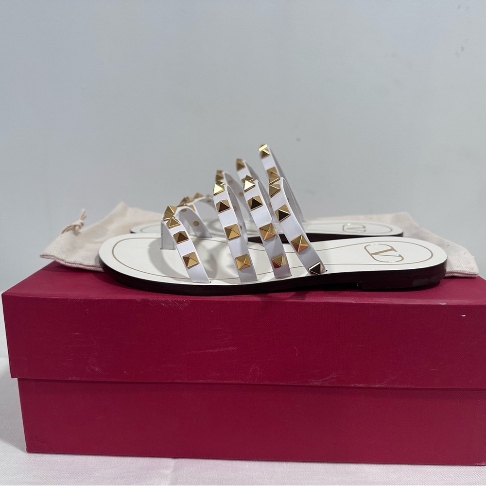 Stylish White Sandals with Gold Accents